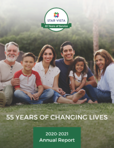 Multi-Generational Family smiling at camera, cover of Annual Report.